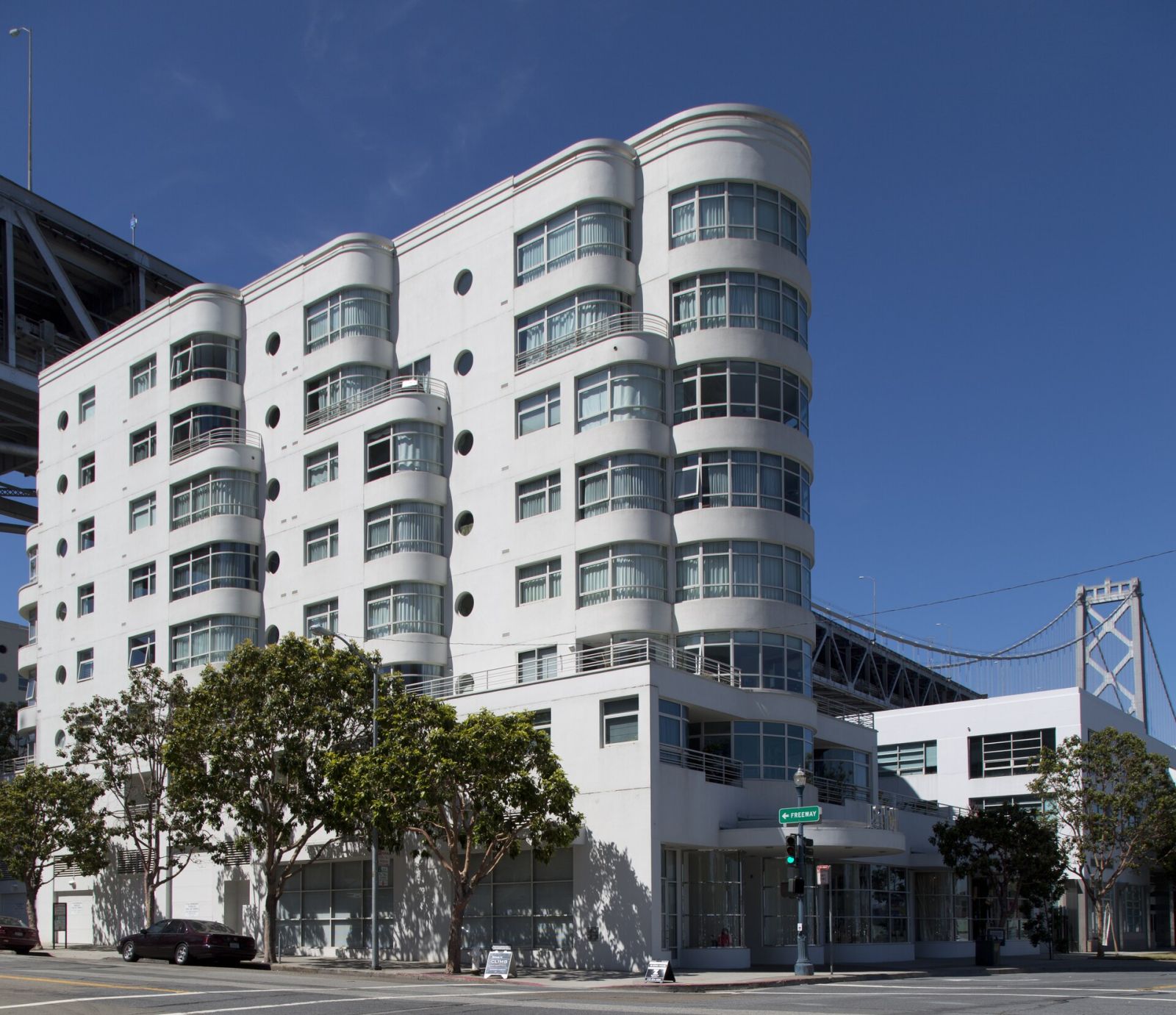Curved glass office building on a city corner